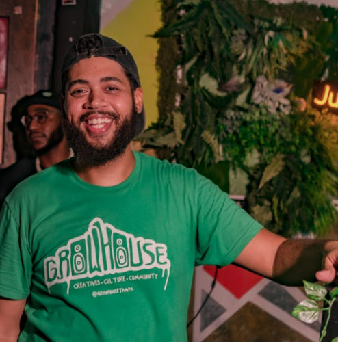 A person in a green shirt